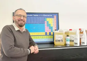 Picture of Rickard in the office next to Industrial products